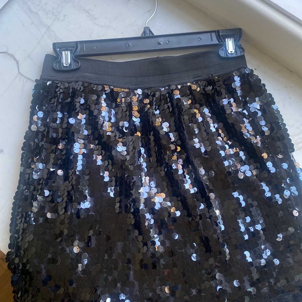 Sequined, black mini skirt. Hem 17 1/2 from top of waistband